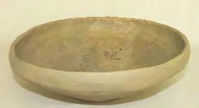 89. Fragment de vas. Cucuieþi-Slatina Veche, com. Solonþ, jud. Bacãu. Lut ars. H: 100 mm. A doua epocã a fierului.