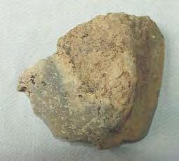 Ciocan de minerit. Bãile Figa, oraº Beclean, jud. Bistriþa-Nãsãud, albia Pârâului Sãrat (partea inferioarã). Piatrã de culoare cenuºiu-verzuie (greutate. 2,480 kg). L: 22,3 cm.