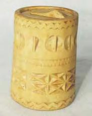 Utilizat pentru pãstrarea sãrii. Piesã de formã tronconicã decoratã cu motive geometrice: val, x - uri, semicercuri. MJM, L.343.