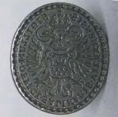 Elemente decorative: câte douã brâie în relief, în partea inferioarã ºi superioarã. MJM, 79. Întocmit: Lucia Pop 231. Tipar sigilar. Ocna Sibiului. Oþel. D: 33 x 31 mm, H: 95 mm. 1729.