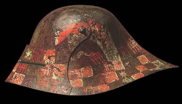 218 281. ábra. Heraldikai motívumokkal festett salade sisak. (1490 körül) (Nagy-Britannia, Leeds, Royal Armouries, L. sz.: IV. 12) 282. ábra. Festett salade.
