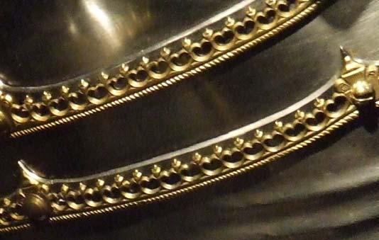 234 306. ábra. A lemez szélét díszítő rátét. (1485 körül) (Lorenz Helmschmid munkája. Ausztria, Bécs, Kunsthistorisches Museum Hofjagdund Rüstkammer, L. sz.: Inv-Nr.