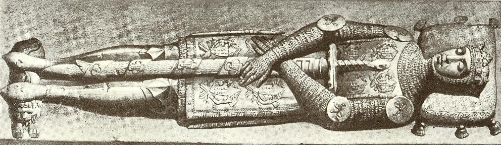 Sir Roger de Bures síremlékén ábrázolt bőr térvédő. (1302 gye, Acton, The Church of All Saints) A fölső végtagok burkolása valamivel később kezdődött el, mint a térdek és a sípcsontoké.