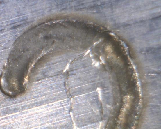 Width of the engraved surface In our microscopic examination we determined that the number 1-5 experiments (line engravement) the width moved between 400-450 μm in all position.