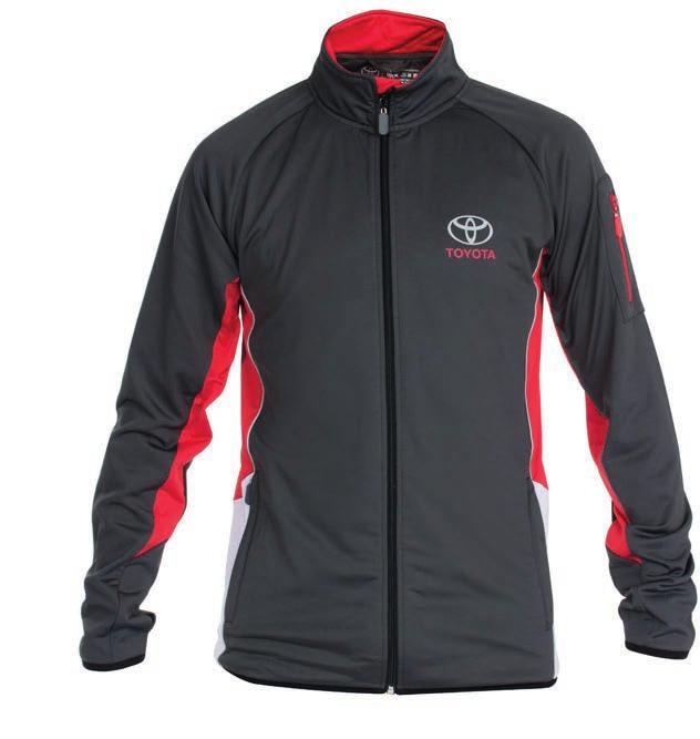 SPORTKOLLEKCIÓ Softshell dzseki TBMC30006000 Szürke poliészter/elasztán keverékéből készülő softshell dzseki piros és fehér részekkel, fényvisszaverő csíkkal.