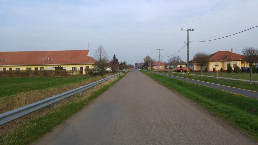 növényzet állománya határozza meg. A telkekkel való kapcsolat, azaz a garázs- és telekbejáró egységes kialakítása is jelentősen befolyásolja a településképi arculatot.