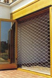 The parallel pieces are loosely clamped together that make the grid solid and easy-to-move.