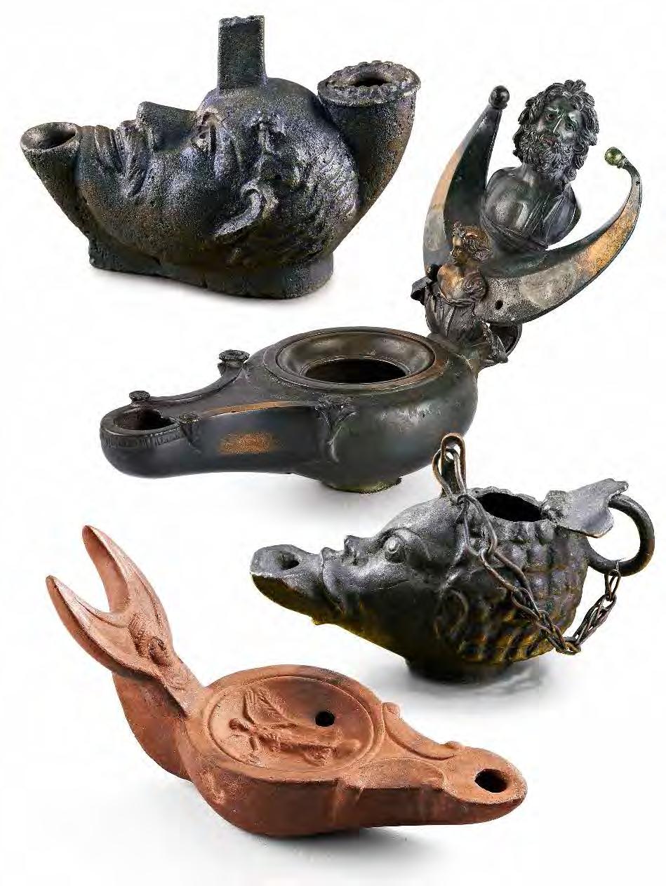 V.49 Groteszk bacchikus arcot mintázó bronzmécses 2. sz. első fele Örvényes-Hosszúrétek (1958 1961), vésett H.: 11,5 cm; Sz.: 5,7 cm; M.: 6,2 cm LDM Ve