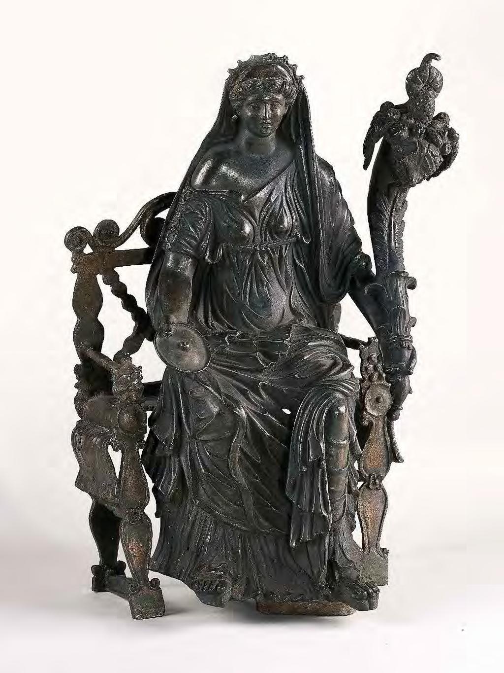 RÓMAIAK 35 V.84 Concordia szobra 1. sz. utolsó harmada Tamási, lararium leletei M.: 34,5 cm WMMM Szekszárd, R.1.941.3. V.85 Sol-mellkép nyélre tűzhető signum formájában 2. sz. utolsó harmada első harmada Adony (Vetus Salina), a Iuppiter Dolichenus szentély leletanyagából (1975) Bronzlemez, öntött bronz Átm.