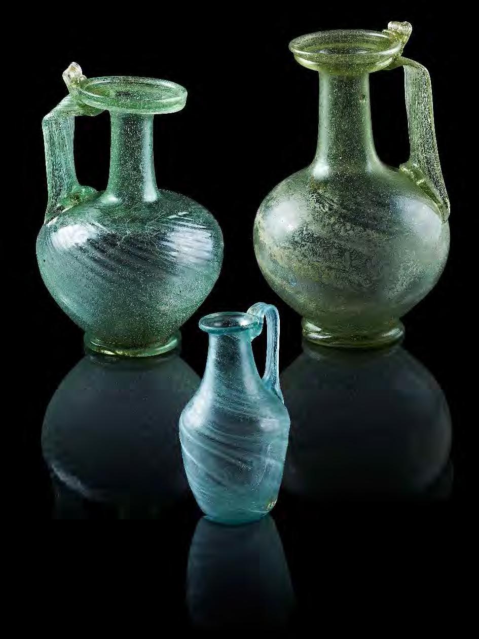 46 RÓMAIAK RÓMAIAK 47 V.134 Üvegkorsó Pécs (Sopianae)-Vörösmarty u. Fújt üveg M.: 21 cm; Átm. (perem): 5 cm; Átm.: 10 cm JPM Pécs, R.87.59.10. V.130 Üvegkorsó Győr-Homokgödrök (Arrabona), sírlelet (1957) Fújt üveg, a hasán tekercsszerű díszítéssel M.