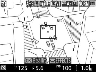 i Miniatűr hatás 1 Nyomja meg az a gombot. A tükör felemelkedik és az objektíven át látható kép megjelenik a fényképezőgép monitorán. a gomb 2 Helyezze el az élességpontot.