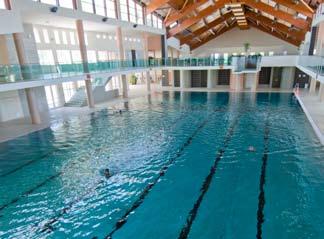 The biggest attraction of the five-pool complex is the 33 m swimming pool designed 4 metres below ground level to accommodate a jump board arching 3 metres above the water surface creating a special
