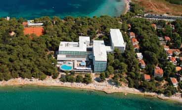 udaljen od plaže. SADRŽAJI: 210 soba, restoran i a la carte restoran, Spa bistro.