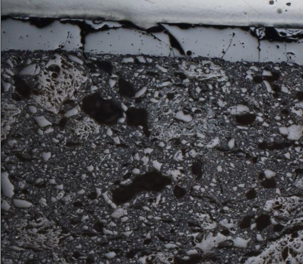 Sztereomikroszkóp képek a kerámia szövetéről 500 µm