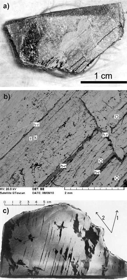 b) Hasadozott-repedezett (h r) kaposfüredi meteorit pásztázó elektronmikroszkópi felvétele.