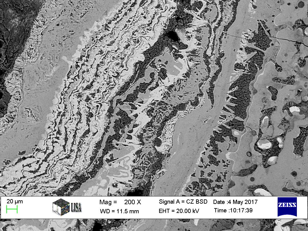 Archeometriai Műhely 2017/XIV./3. 193 5. ábra: Réteges szerkezetű salak SEM-képe (kovácssalak vagy bucatömörítés salakja) Fig. 5.: SEM-micrograph of a slag with layered structure (smithing slag of purification slag) 6.
