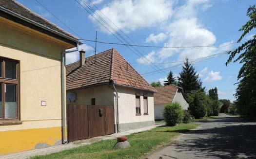 kerítéssel épített, zártabb