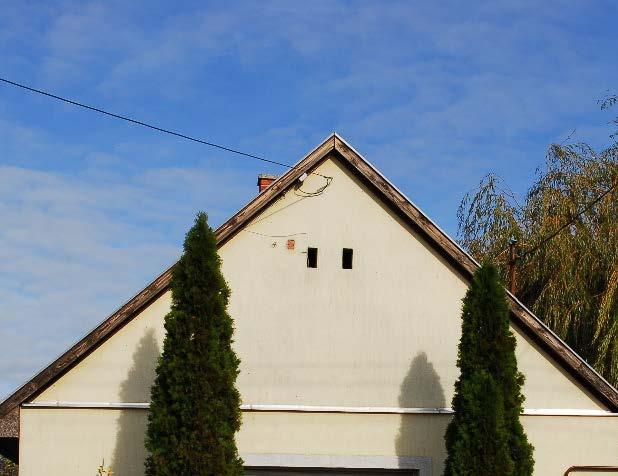 Részletképzésre ad lehetőséget a zsalugáteres ablak,