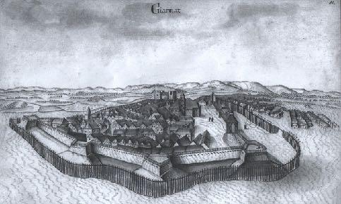 JOHANN LE DENTU TUSRAJZA: A BALASSAGYARMATI VÁR(OS) A rajz egy kompakt kisvárost ábrázol, várfalakon belüli utcákkal,és házsorokkal, két templommal és természetesen egy várral, legalábbis egy