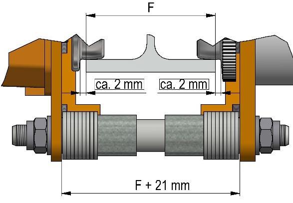 4.3 Mechanikai összeszerelés A függesztőcsapokat a haladómű oldalpajzsain úgy kell rögzíteni, hogy a futókerekek pereme és a tartósín pereme között kb. két milliméter hézag maradjon.