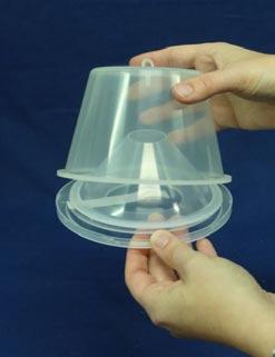 Place the transparent cone on the lid,