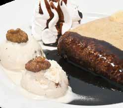 DESSZERTEK DESSERTS DESSERTS GUNDEL PALACSINTA DIÓFAGYIVAL Gundelpalatschinken mit Nusseis / Pancake Gundel style with walnut ice-cream