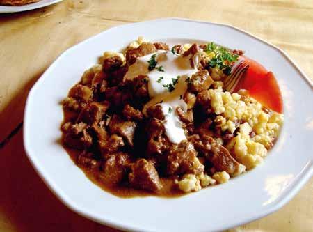 Pörkölt (Stew) This real favourite of traditional Great Plain peasant cuisine is a ragout with succulent chunks of meat, cooked in a thick, onion and red paprika sauce.