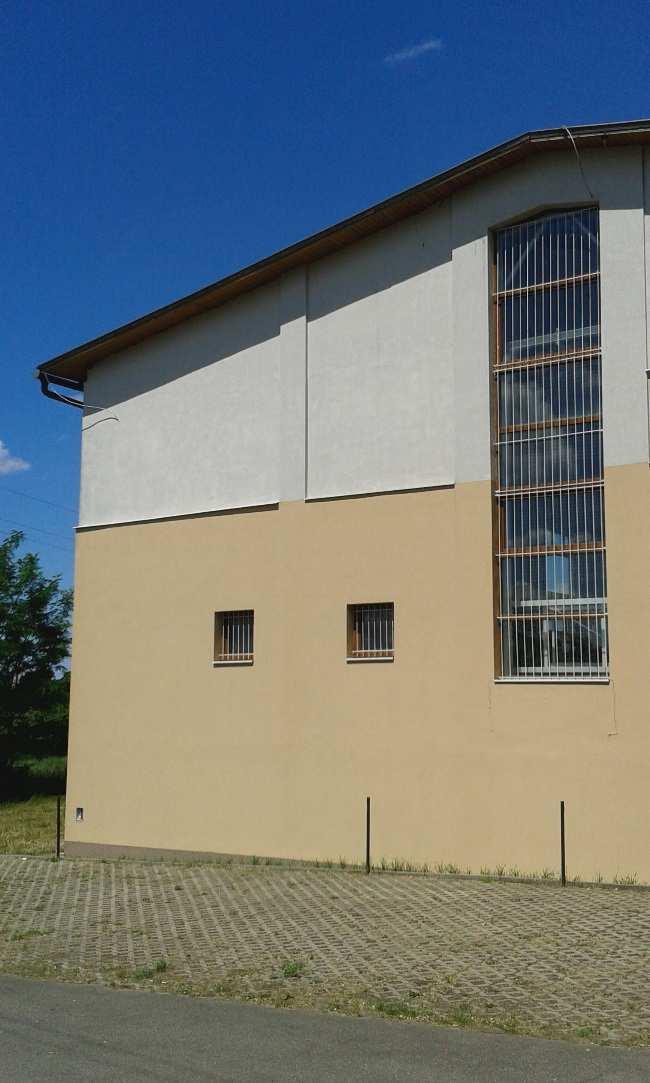 RÉSZLETEK épület építészeti részletek A nagy tömegű tornaterem épületét a részletek egysége teszi