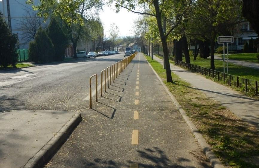 keretében különös tekintettel a parkolási igények kezelésére elválasztott kerékpáros létesítmény kialakításának tervezését.