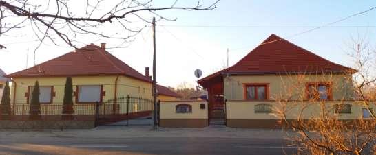új ház (kár a tömör kerítésért)