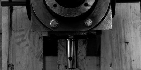 One axis is driven and it drives the other five axel trough bevel gears. Mass reduction and rigid construction were important design requirements of the gear housing.