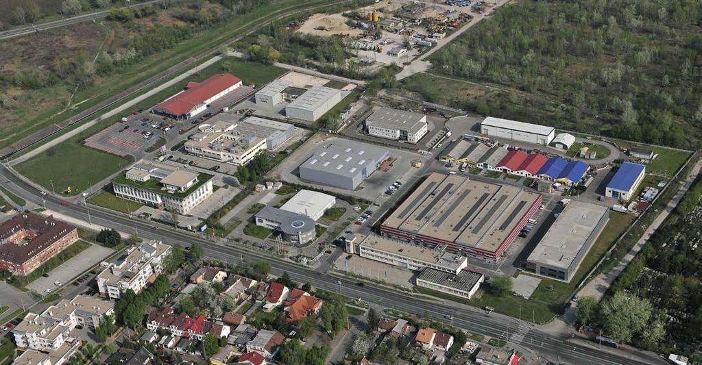 AJÁNLÁSOK ÚJ GAZDASÁGI TERÜLETEKRE, IPARI PARKOKRA - Korszerű anyagok és épületszerkezeti megoldások alkalmazandóak. Csillogó lemezfedés sem a homlokzaton, sem a tetőszerkezetben nem alkalmazható.