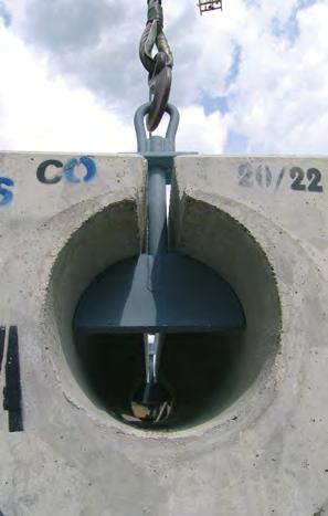 A rendszer építése: A beton alapra terítsünk száraz betont 30-mm vastagságban. A szemnagyság max. 10 mm lehet (2. kép).