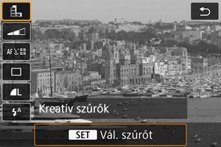 v Fényképezés kreatív szűrőeffektusokkal A <v> (Kreatív szűrő) módban tíz különböző szűrőeffektus (Szemcsés fekete-fehér*, Lágy fókusz*, Halszem-effektus*, Vízfestmény effektus*, Játékkamera