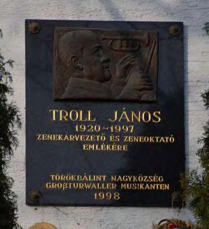 homlokzat, tagozatok nélkül, húzott párkány nyílászárók: váz-táblázatos bejárati ajtó külső tömör zsalutáblákkal, új ablakok lábazat: vakolt kerítés: a Kazinczy utcában jellegtelen kerítés a