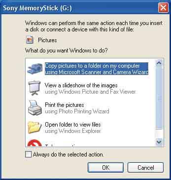 Képek másolása a számítógépre * A kommunikáció során a képernyőn a szimbólum látható. Addig ne használja a számítógépet, amíg ez a szimbólum látható.