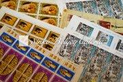 8 albumnyi bélyeg + speciális Stanley Gibbons katalógus.