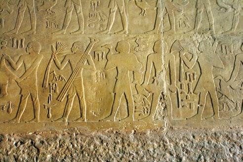 54. kép. Befejezetlen relief részlete: áldozatvivők Ahethotep vezír masztabájában. Óbirodalom, V.