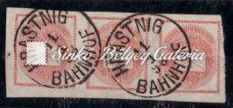 Hírlapbélyeg, 1kr-os narancssárga színű 1a vízjelű (B3), 3-as összefüggés Hrastnig/Bahnhof osztrák vasútbélyegzővel 1871.  445. tétel 1871.