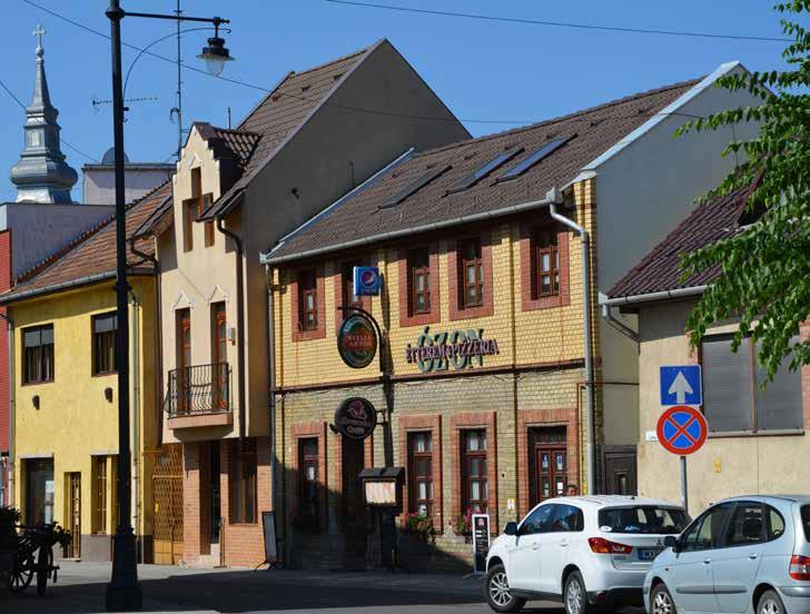 6. ÉPÍTÉSZETI AJÁNLÁSOK Településközpont A településközpont építészeti karaktere kisvárosi karakter zártsorú beépítés, egy-két szintes épületek vakolt, színezett, díszített falfelületek cserépfedés