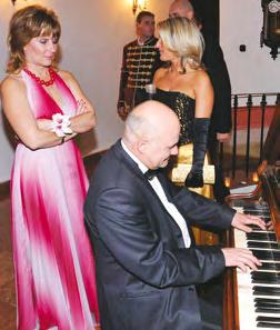 kujdes Gyula Feher dhe grupi i tij muzikor cigan, si dhe artistët e