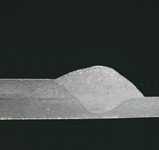 shield gas and the practically no spatter. Figure 2.