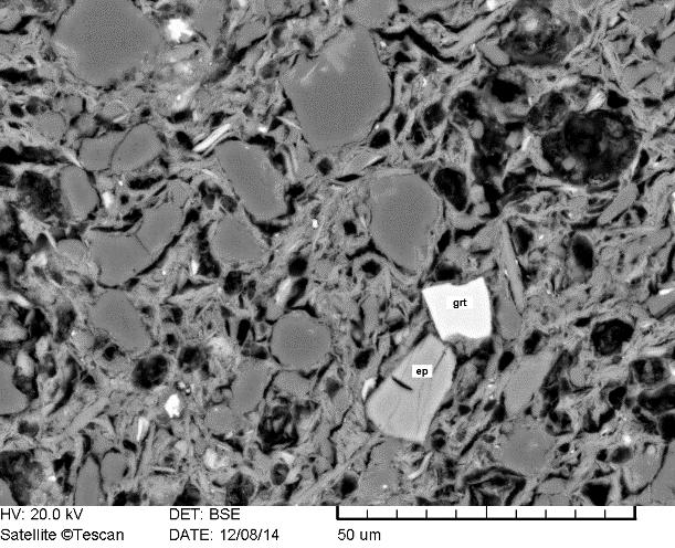 186 12. ábra: Nehézásványok fažanai amphora vékonycsiszolatában. Elektron-mikroszkópos (SEM-BSE) kép. ep: epidot, grt: gránát. Fig. 12.: Heavy minerals in thin section of amphora from Fažana.