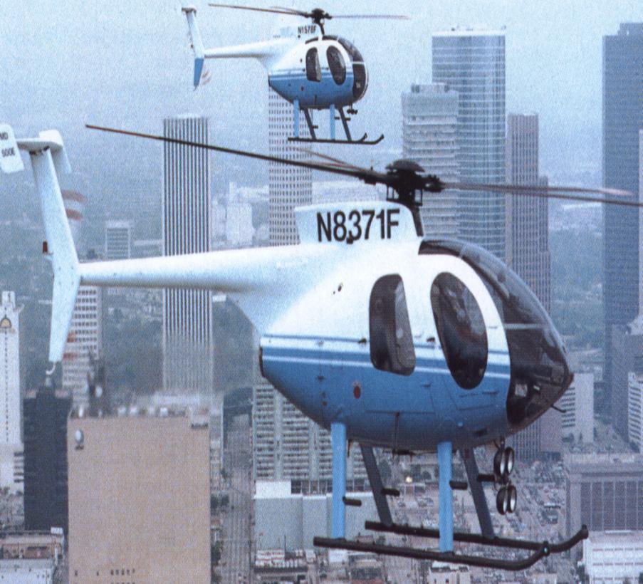 6. ábra. MD 500 (McDONELL DOEGLAS HELICOPTERS) rendőri és tűzoltói alkalmazásra. Forrás: A világ repülőgépei. (Mester kiadó, Budapest 2000-2005 3. csoport 53.