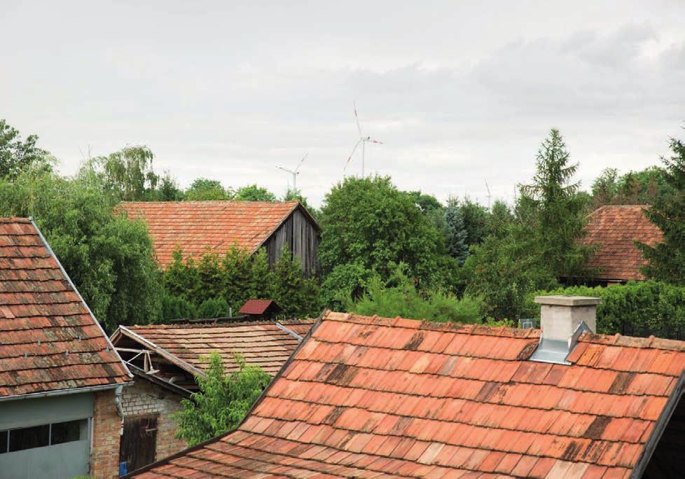 10 Az épülethomlokzatok színe a fehértől a halvány pasztellszínekig terjed, melyek meleg és hideg minőségekben is előfordulnak.