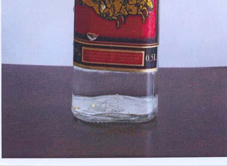 Aranyvodkát és a mellette álló-attila a Hunok királya Mongol Aranyvodkát.