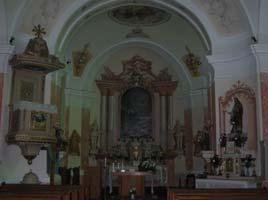 olvasóval. Feltehetően a donátor arcképe.