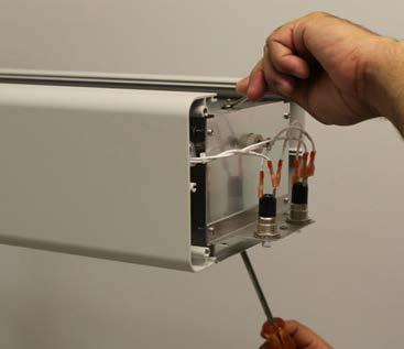 ) Figure 6: Engaging the Front Reflector Screw 8.