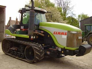 5. feladat Az ábrán látható gumihevederes erőgép tömege 23000 kg. A talaj és a heveder közötti súrlódási tényező 0,45. 50.
