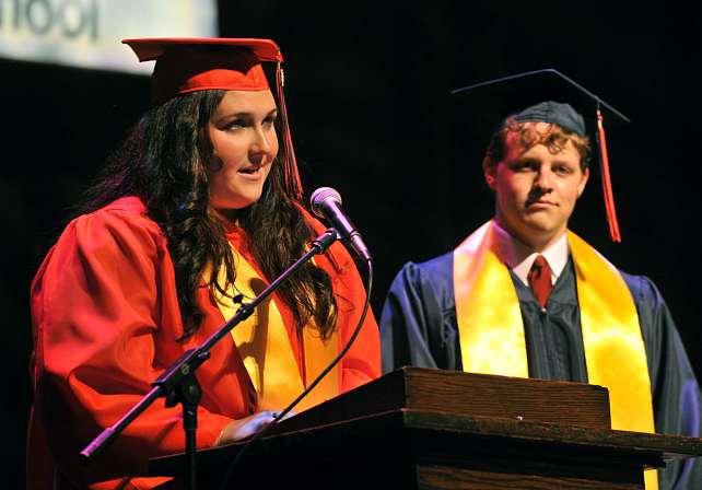 Valedictorians Victoria Lynn Mary Martin and Timothy James Wychock address fellow classmates during the afternoon commencement ceremony at the F.M. Kirby Center. James M.